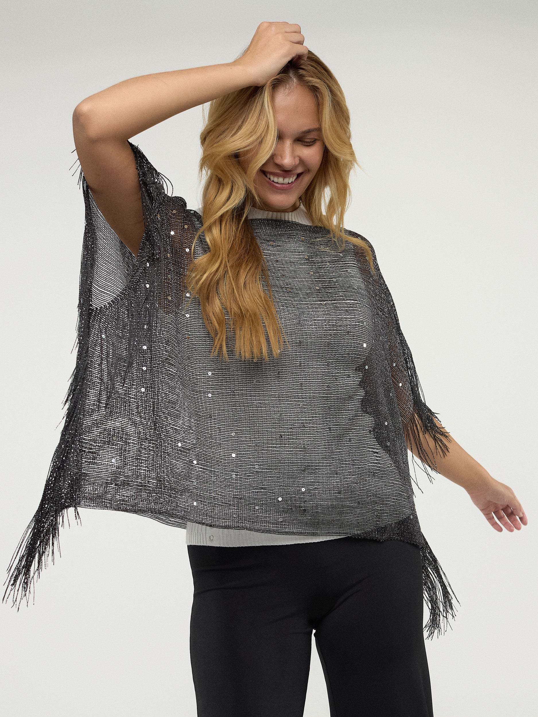 Poncho en tricot